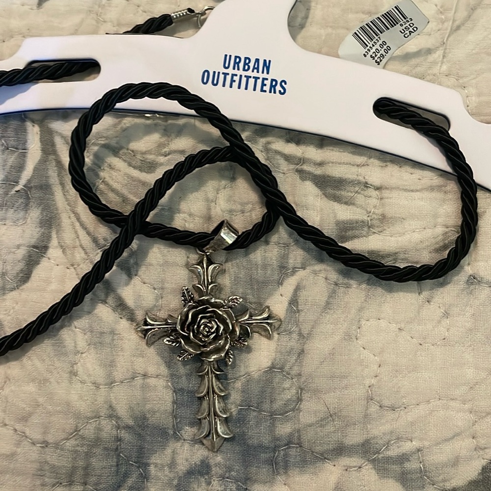 Urban Outfitters silver cross on black cord